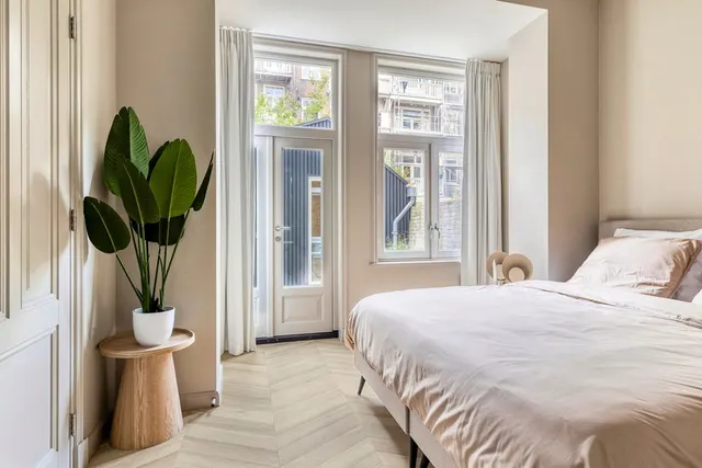 Bedroom with patio access at Splendom Vondelpark